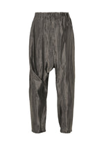 A detail shot of the IM MEN SATIN WASH trousers.