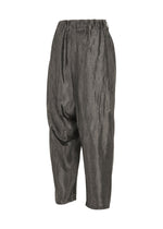 A detail shot of the IM MEN SATIN WASH trousers.