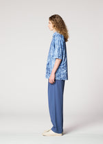 A model wears the IM MEN NAVY BOTTOMS navy-bottoms-trousers-dark-blue.
