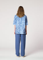 A model wears the IM MEN NAVY BOTTOMS navy-bottoms-trousers-dark-blue.