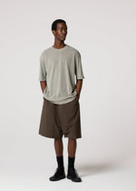 A model wears the IM MEN NAVY BOTTOMS navy-bottoms-trousers-dark-brown-1.
