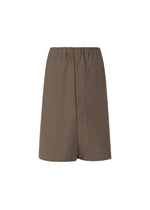 A product shot of the IM MEN NAVY BOTTOMS trousers in dark brown.