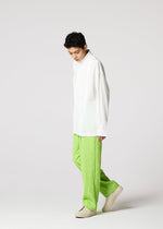 A model wears the IM MEN WHITE SHIRT clothing.