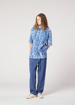 A model wears the IM MEN SPEC SHIRT shirt.