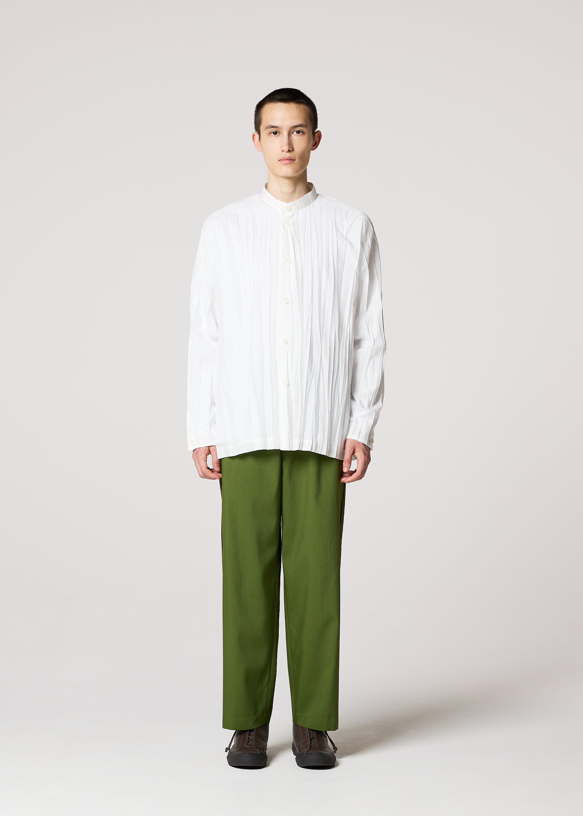 A model wears the IM MEN WRINKLE SHIRT shirt.