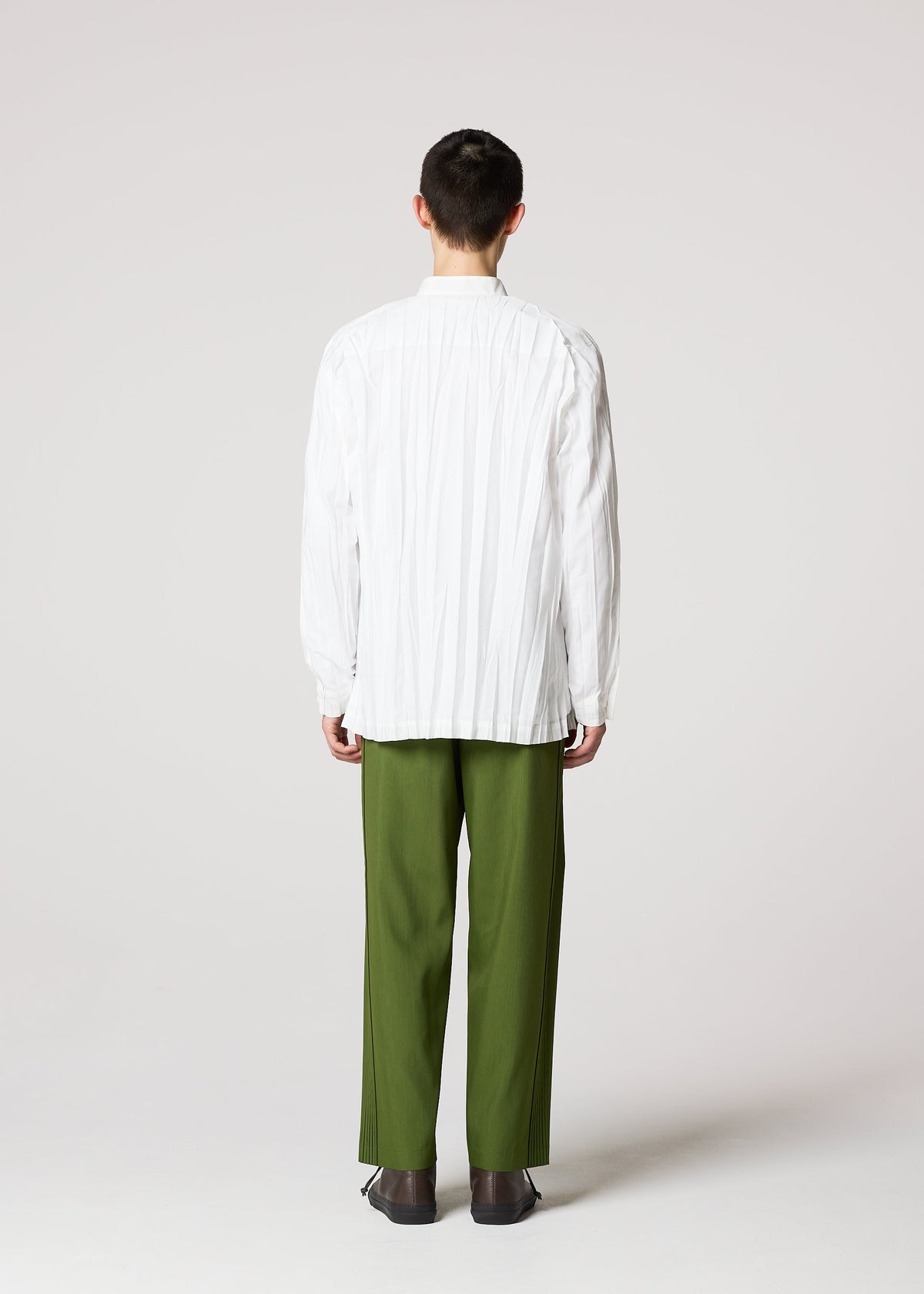 A model wears the IM MEN WRINKLE SHIRT shirt.