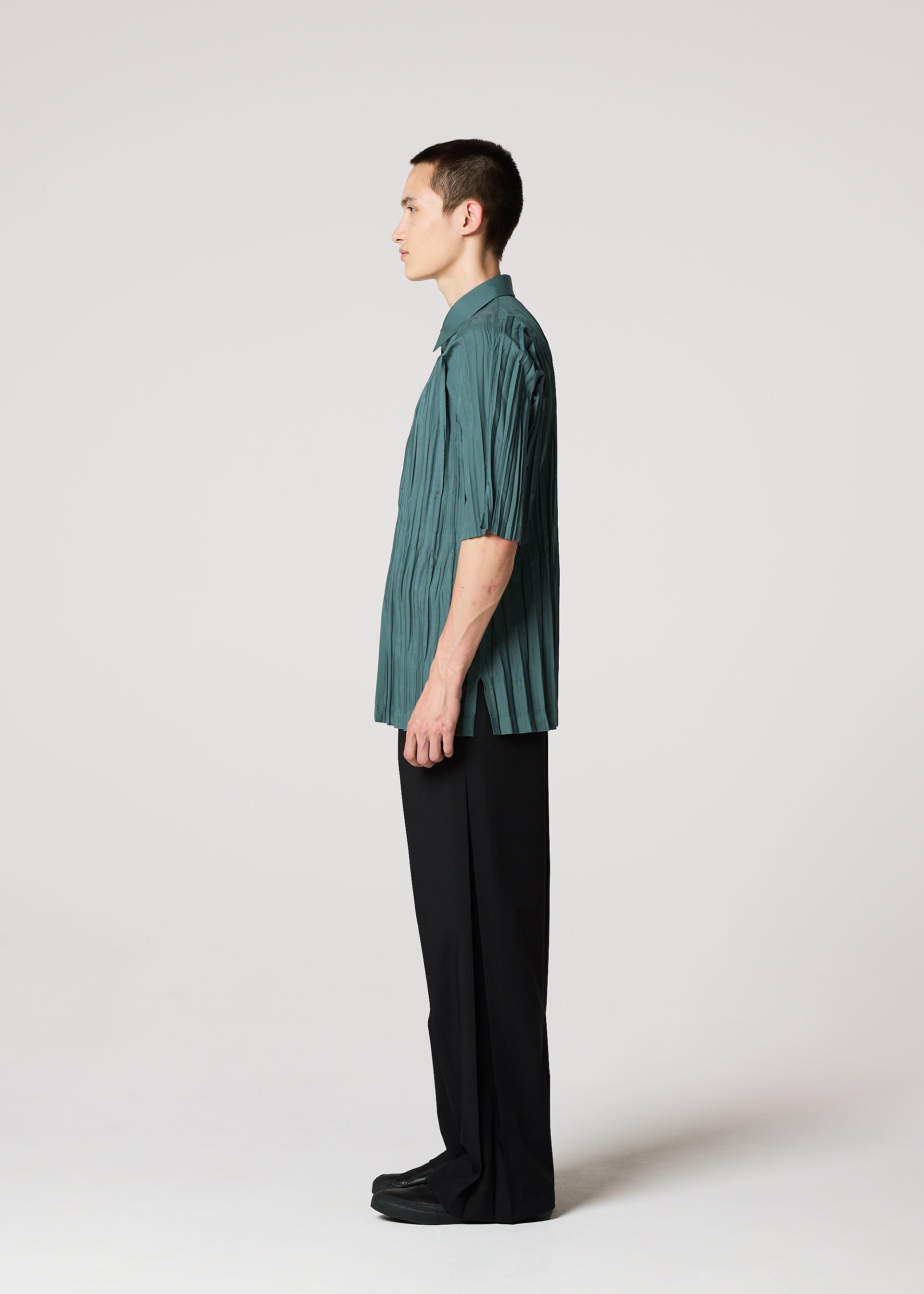 A model wears the IM MEN WRINKLE SHIRT shirt.