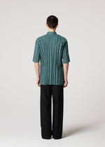 A model wears the IM MEN WRINKLE SHIRT shirt.