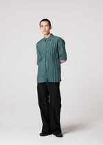 A model wears the IM MEN WRINKLE SHIRT shirt.