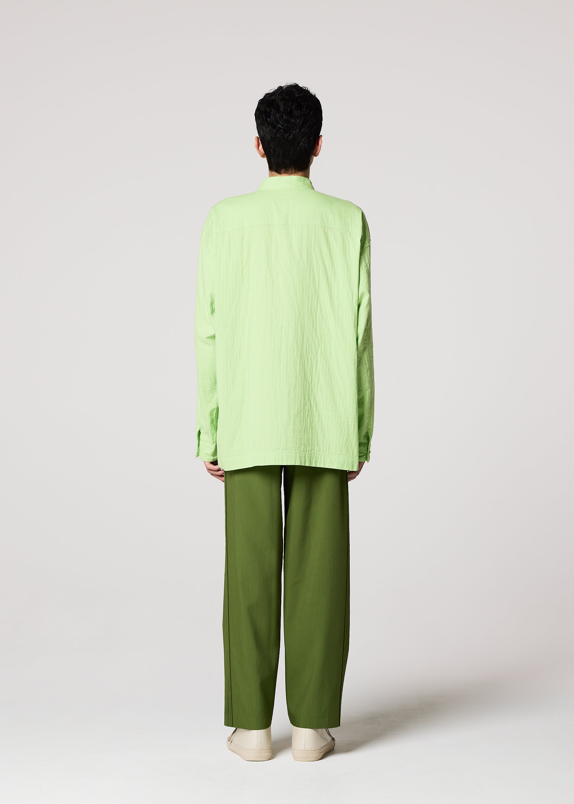 A model wears the IM MEN DOUBLE FACE COTTON SHIRT shirt.