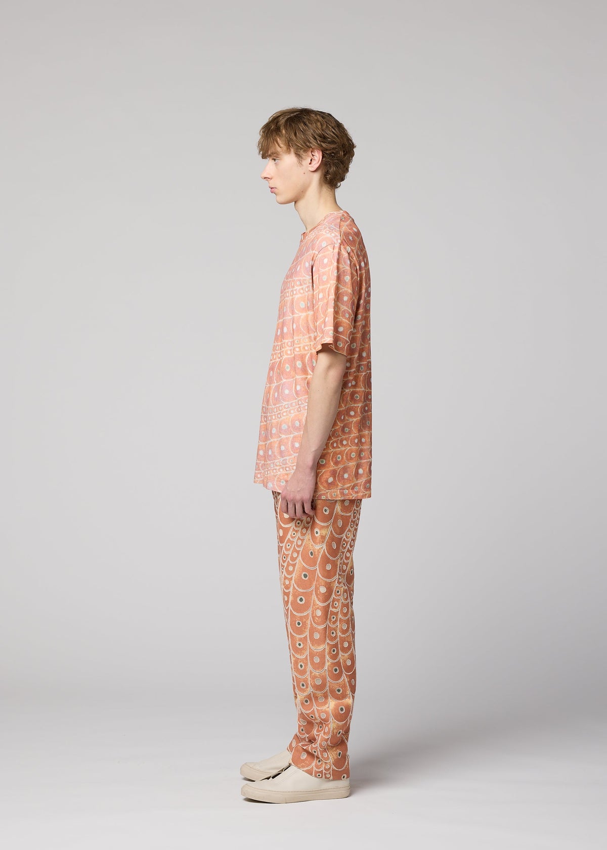 A model wears the IM MEN UROKOMON T top.