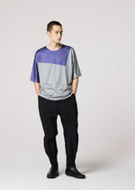 A model wears the IM MEN GEOMETRY PLATING JERSEY top.