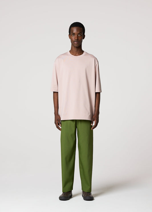 A model wears the IM MEN 60/2 JERSEY STITCH top.