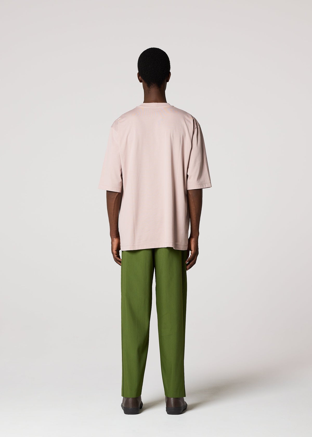 A model wears the IM MEN 60/2 JERSEY STITCH top.