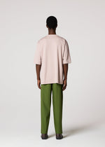 A model wears the IM MEN 60/2 JERSEY STITCH top.