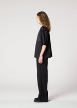 A model wears the IM MEN FLAT T top.