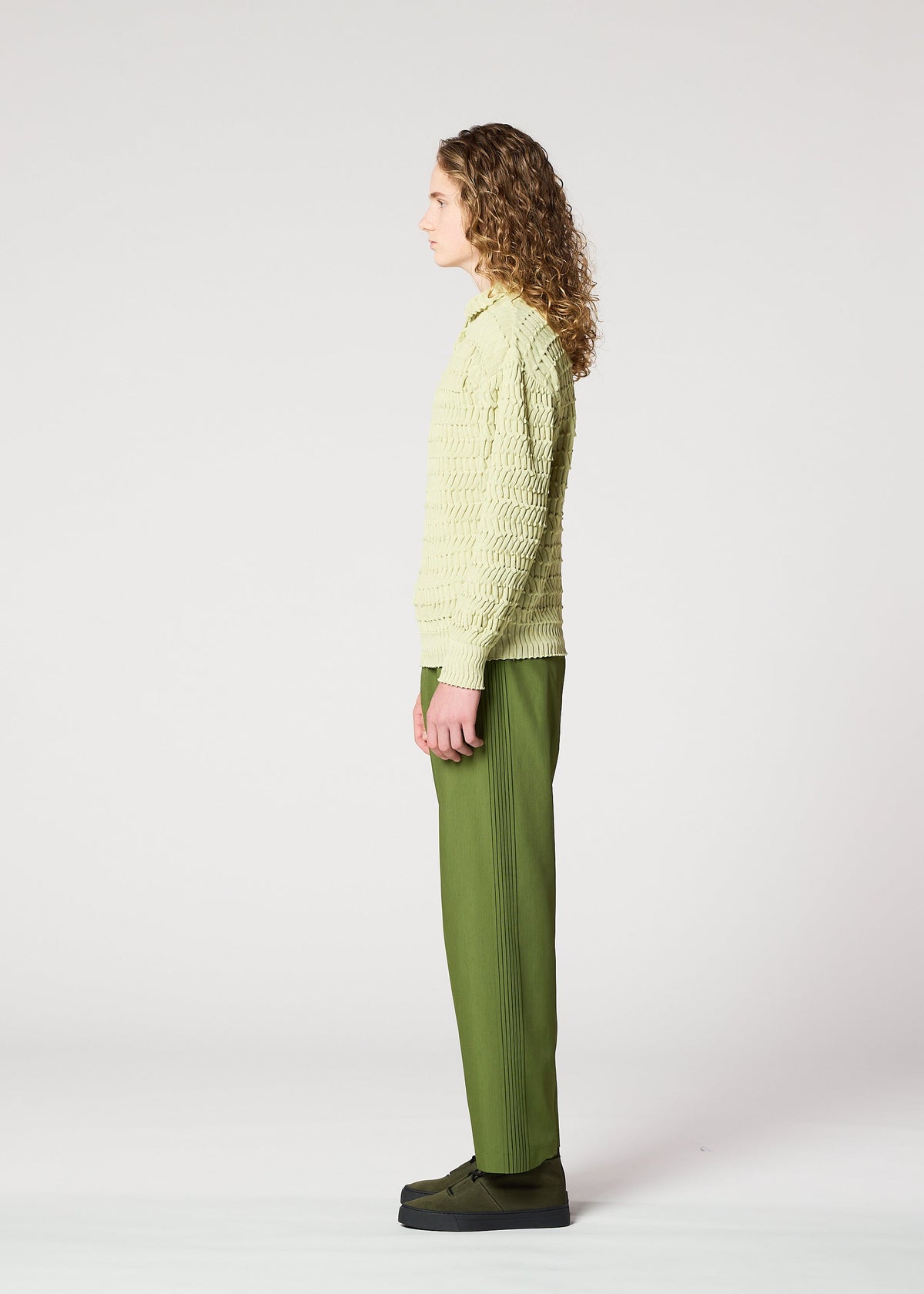 A model wears the IM MEN ZIG ZAG RIB KNIT top.