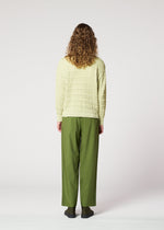 A model wears the IM MEN ZIG ZAG RIB KNIT top.