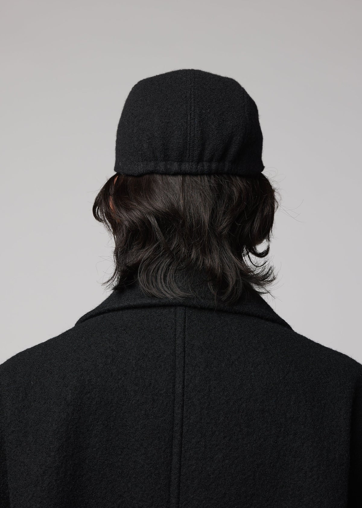 A model wears the IM MEN FULLER WOOL CAP fuller-wool-cap-cap-blue.