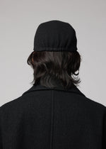 A model wears the IM MEN FULLER WOOL CAP fuller-wool-cap-cap-black.