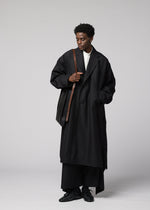 A model wears the IM MEN LEATHER PLEATS leather-pleats-shoulder-bag-brown.