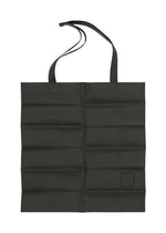 A product shot of the IM MEN PATA PA tote in black.