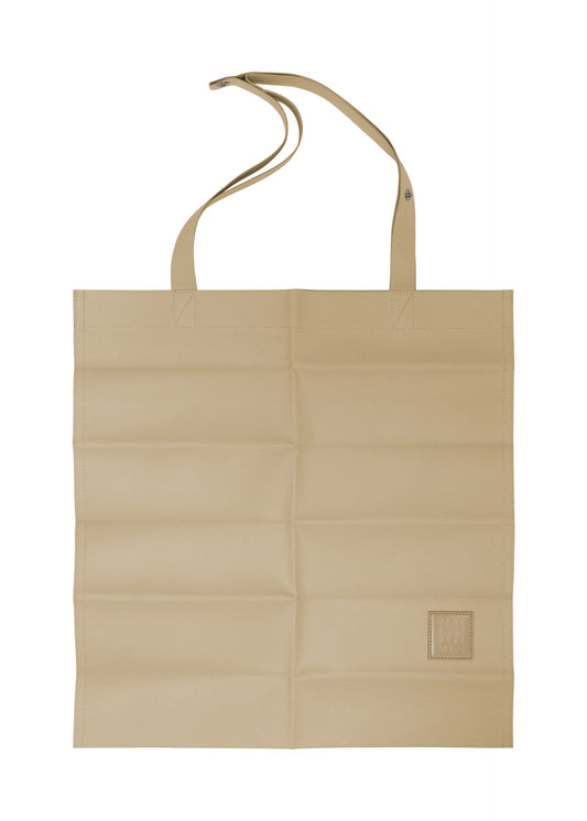 A product shot of the IM MEN PATA PA tote in beige.