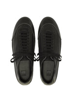A detail shot of the IM MEN FLIPPER shoes.