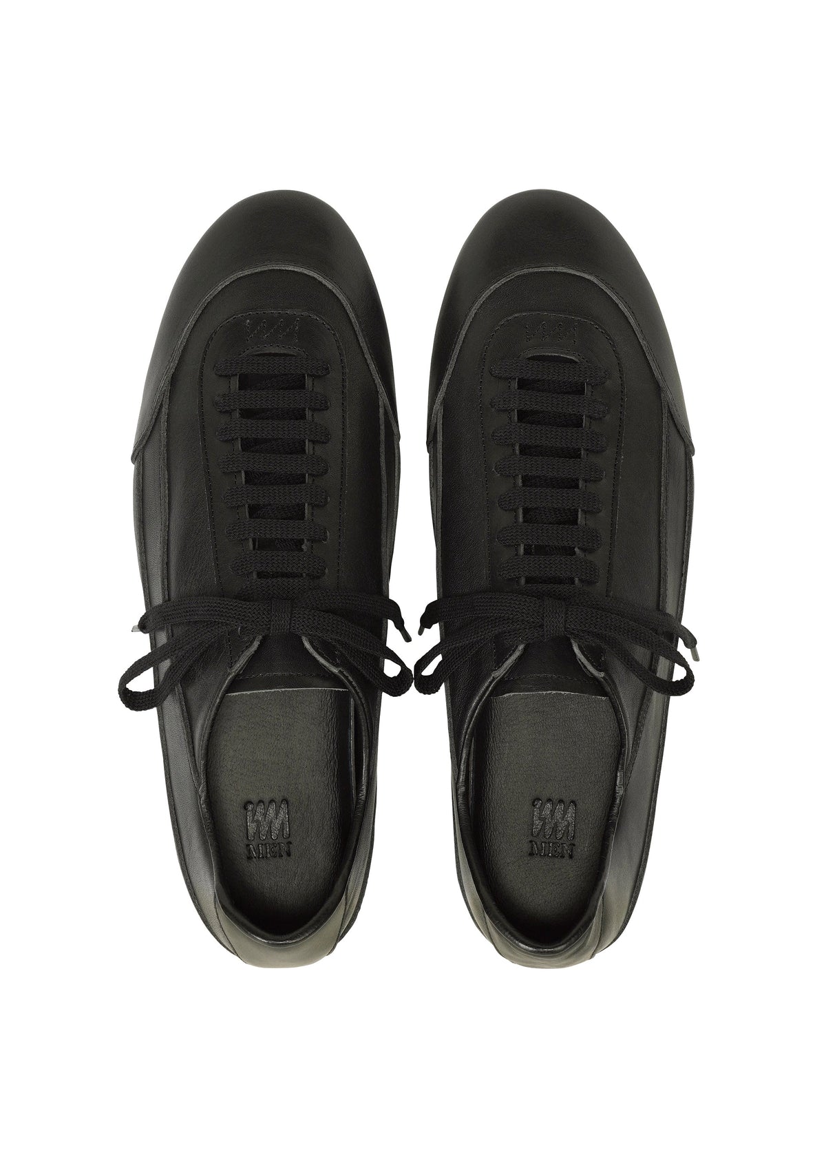 A detail shot of the IM MEN FLIPPER shoes.