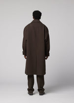 A model wears the IM MEN FULLER WOOL fuller-wool-coat-black.