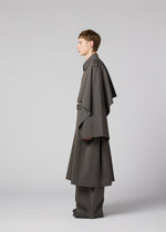 A model wears the IM MEN OVERLAP overlap-coat-brown.