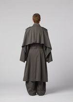 A model wears the IM MEN OVERLAP overlap-coat-brown.