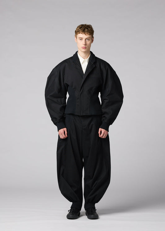 A model wears the IM MEN CLAY clay-jacket-white.