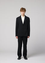 A model wears the IM MEN SHRINK WOOL shrink-wool-single-breasted-jacket-brown.