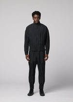 A model wears the IM MEN WAFT BLACK waft-black-trousers-black-1.
