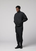 A model wears the IM MEN WAFT BLACK waft-black-trousers-black-1.