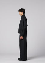 A model wears the IM MEN WAFT BLACK waft-black-trousers-black-2.