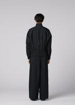 A model wears the IM MEN WAFT BLACK waft-black-trousers-black-2.