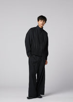 A model wears the IM MEN WAFT BLACK waft-black-trousers-black-2.