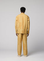 A model wears the IM MEN KASURI kasuri-straight-leg-trousers-black.