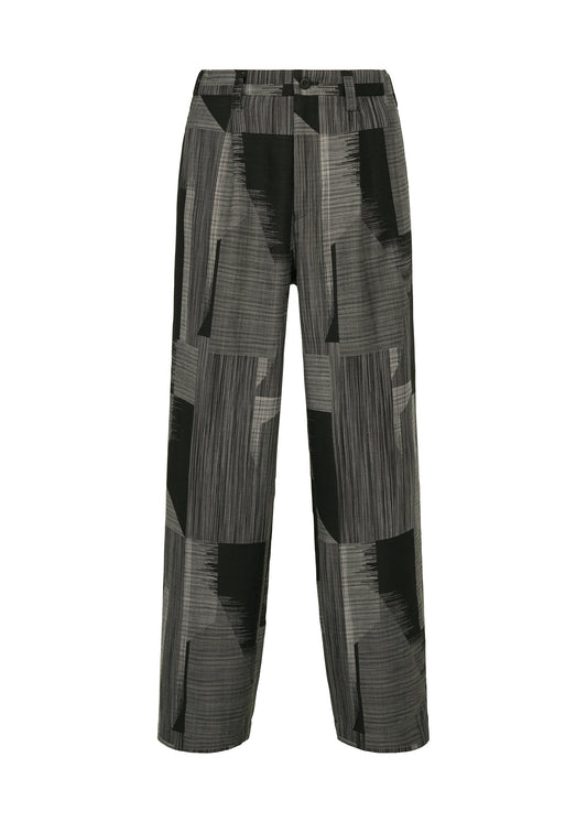 A product shot of the IM MEN KASURI trousers in black.