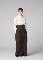A model wears the IM MEN SHRINK WOOL shrink-wool-trousers-black.