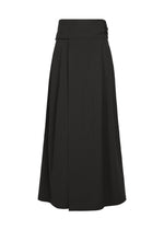 A product shot of the IM MEN SHRINK WOOL trousers in black.