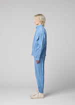 A model wears the IM MEN EDGE edge-trousers-navy.