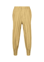 A product shot of the IM MEN EDGE trousers in beige.