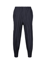 A product shot of the IM MEN EDGE trousers in navy.