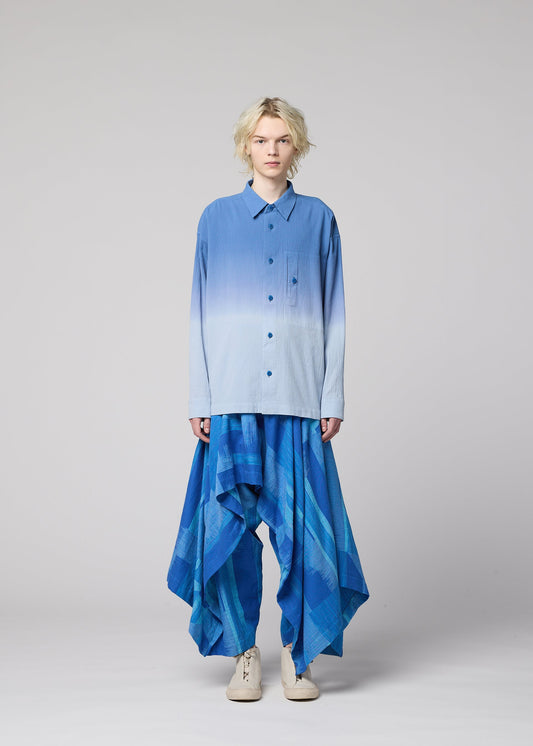 A model wears the IM MEN DRIP SHIRT drip-shirt-shirt-blue.