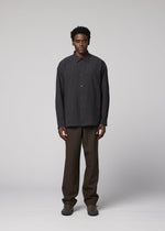 A model wears the IM MEN DOUBLE WEAVE CREPE double-weave-crepe-shirt-blue.