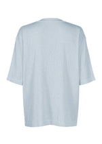 A detail shot of the IM MEN CREPE TUCK JERSEY top.