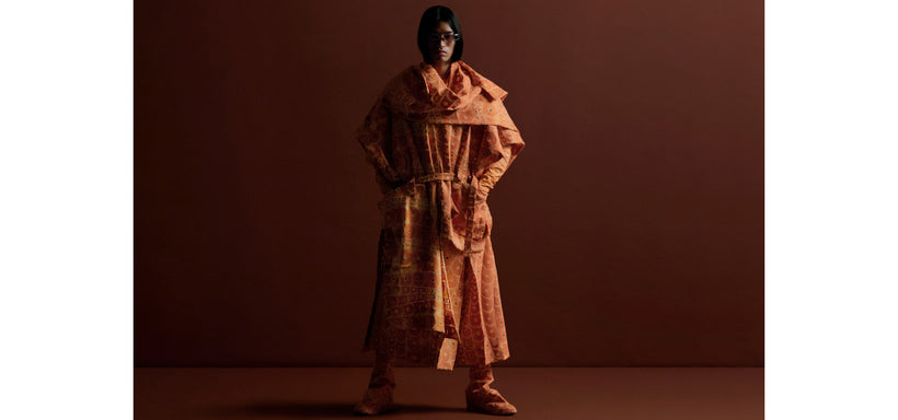 Centre: Model wearing UROKOMON Vest in Red and UROKOMON STOLE in Red, confident pose against a brown background.